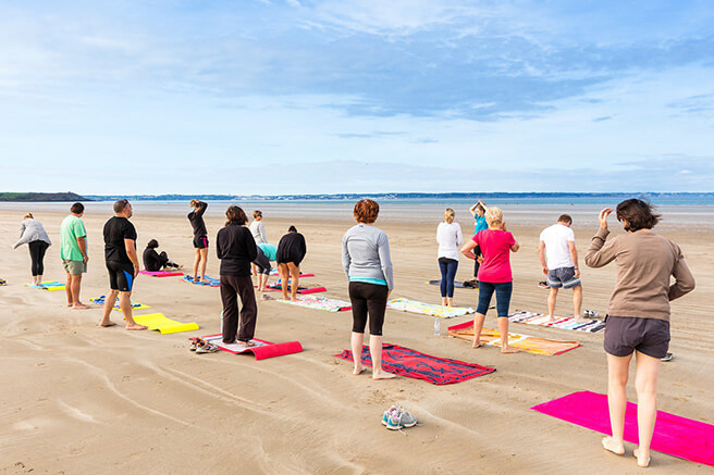 cours de Yoga sur la plage